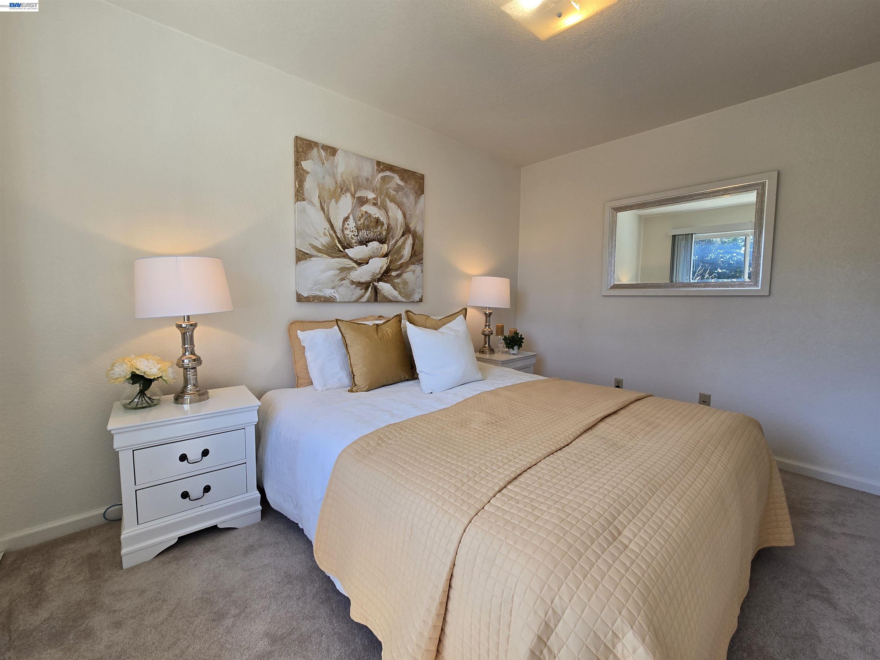 161 Hackamore Lane Fremont, CA 94539 - Photo 53 of 60 a bedroom with a bed and a lamp on dresser