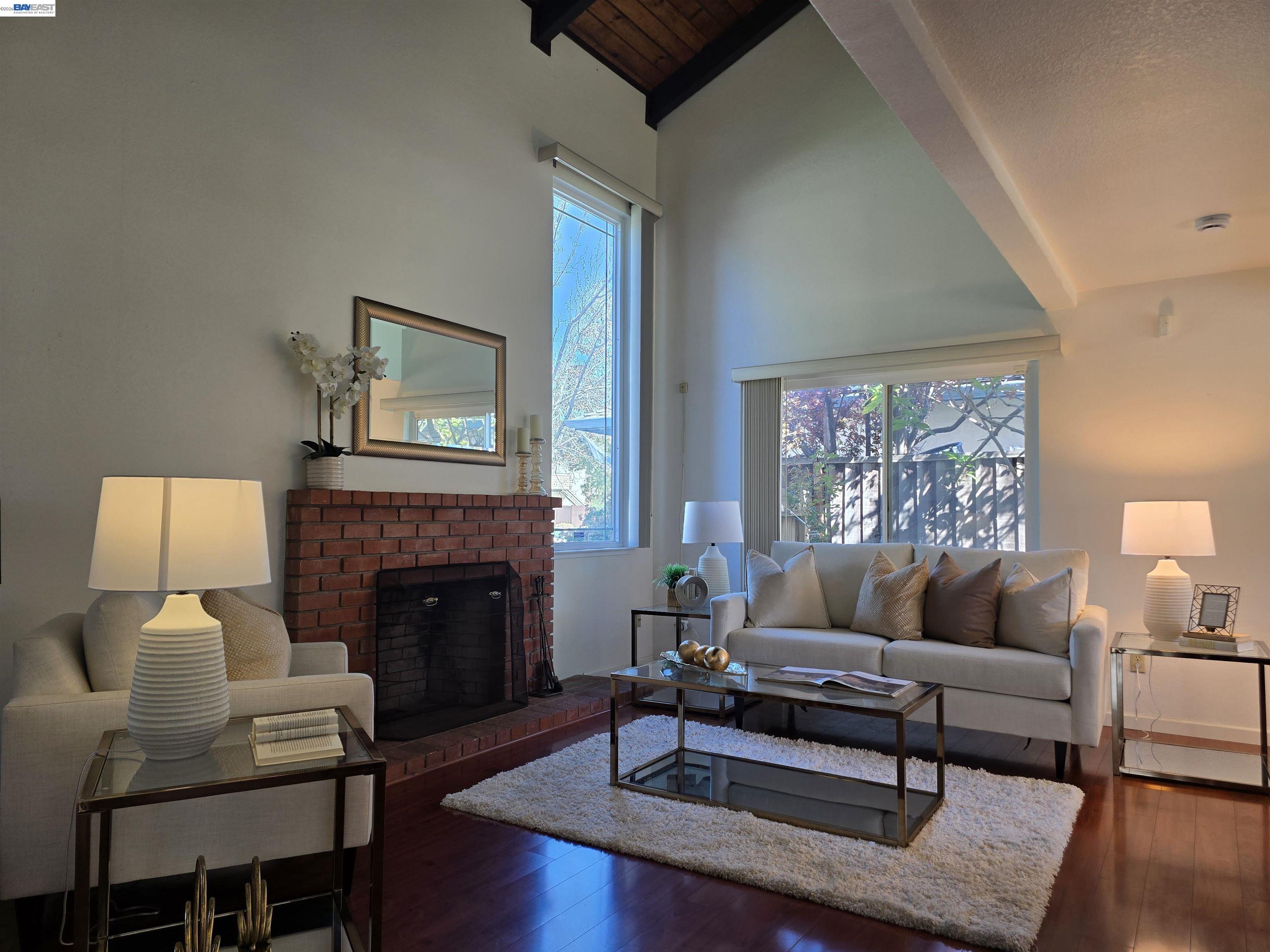 161 Hackamore Lane Fremont, CA 94539 - Photo 9 of 60 a living room with furniture and a fireplace