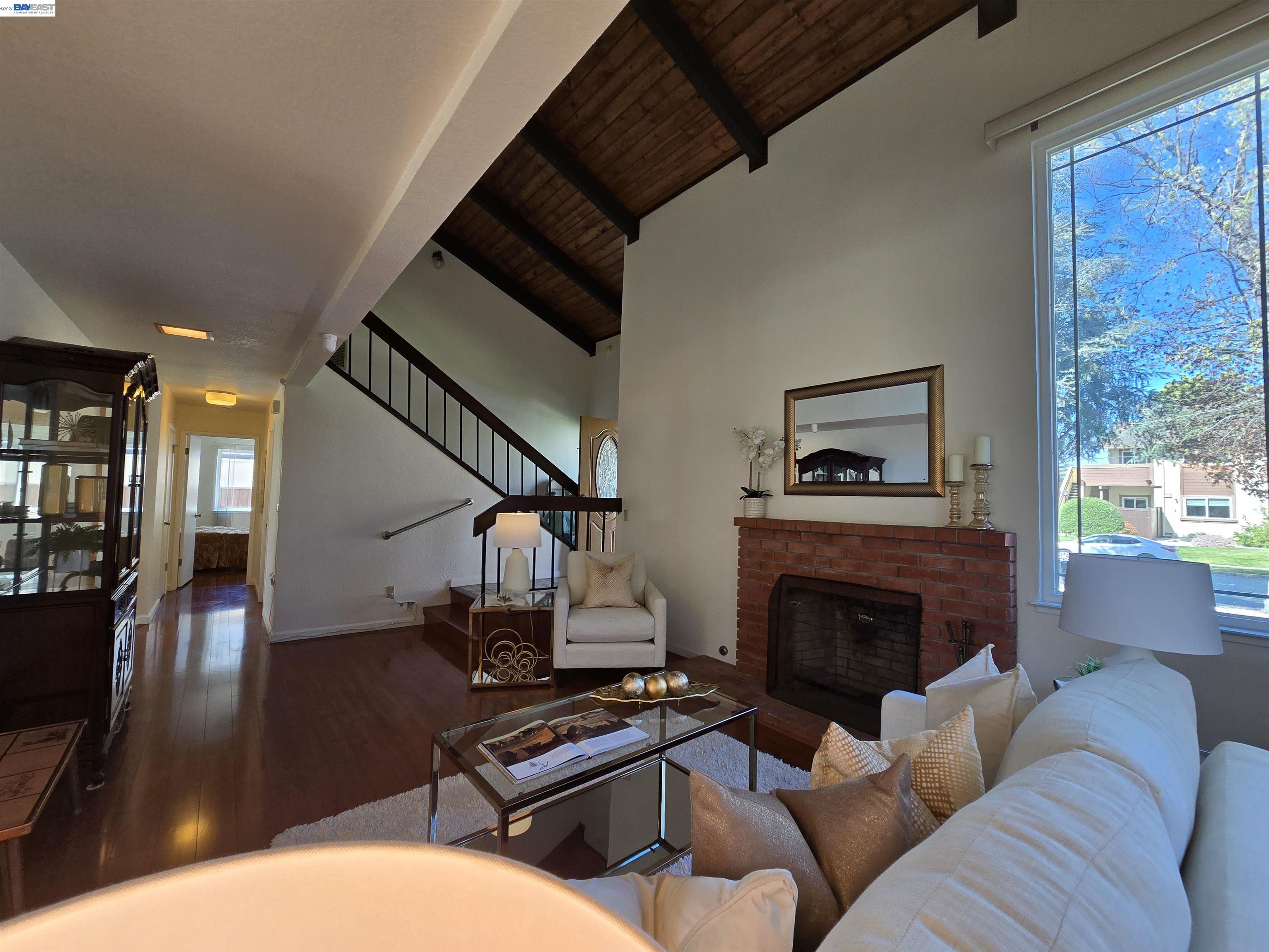 161 Hackamore Lane Fremont, CA 94539 - Photo 10 of 60 a living room with furniture and a fireplace