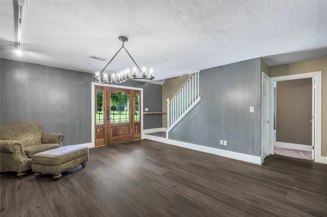 a view of livingroom with furniture and wooden floor