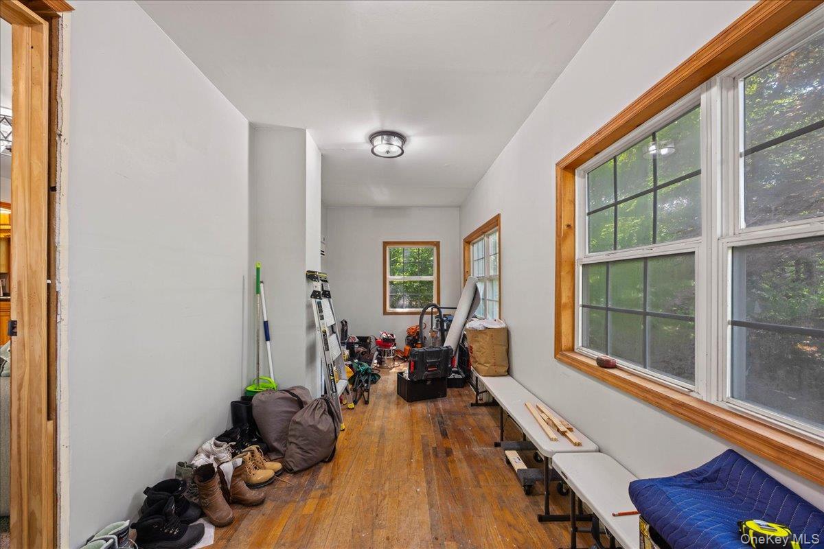 12 Cascade Trail Monroe, NY 10950 - Photo 18 of 20 Versatile bonus room perfect for creating the space you've always wanted- office, playroom, craft room, storage, or mudroom with washer/dryer setup!