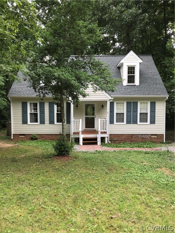 6904 Full Rack Court Midlothian, VA 23112 - Photo 1 of 29 a front view of a house with a garden
