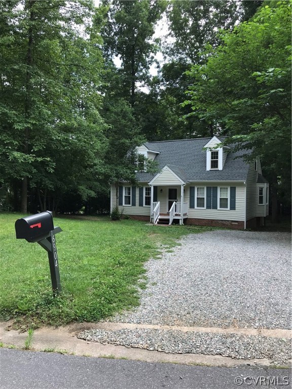 6904 Full Rack Court Midlothian, VA 23112 - Photo 2 of 29 a front view of a house with a yard