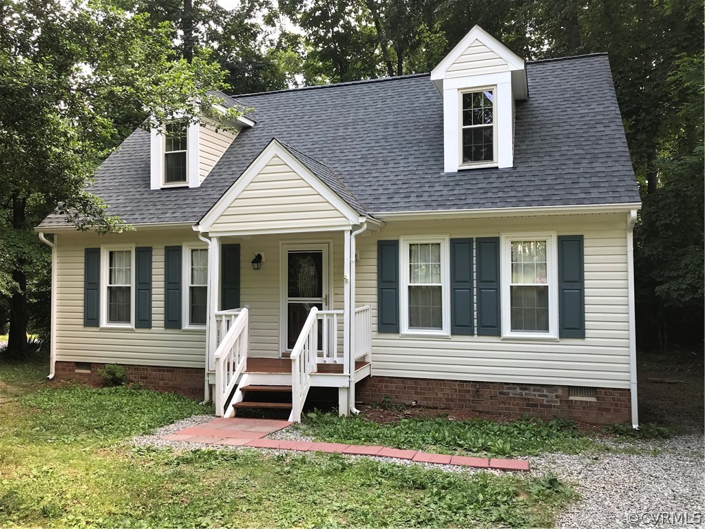 6904 Full Rack Court Midlothian, VA 23112 - Photo 3 of 29 a view of a house with a yard porch and wooden fence