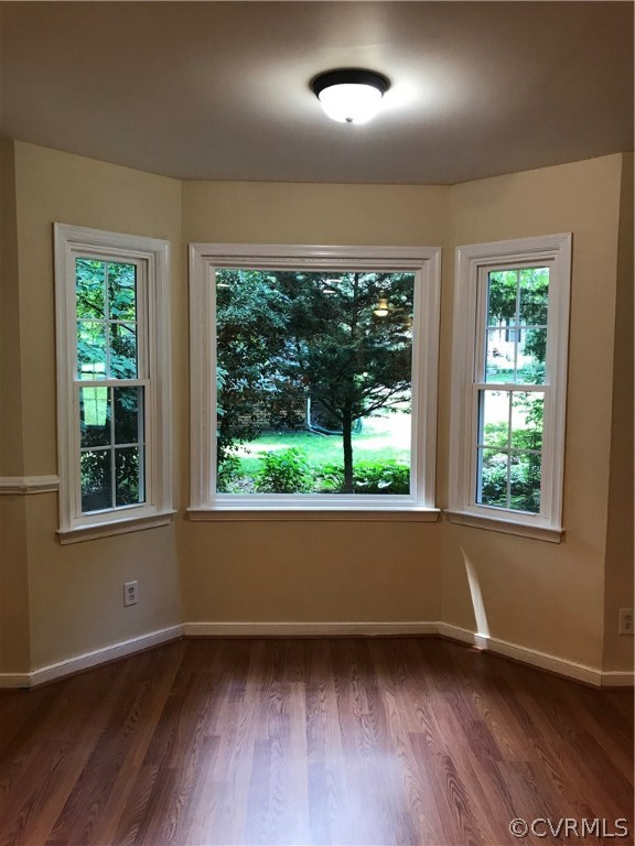6904 Full Rack Court Midlothian, VA 23112 - Photo 9 of 29 an empty room with wooden floor and windows