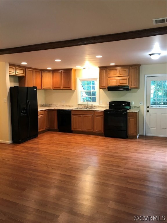 6904 Full Rack Court Midlothian, VA 23112 - Photo 10 of 29 a large kitchen with stainless steel appliances granite countertop a refrigerator and a stove top oven