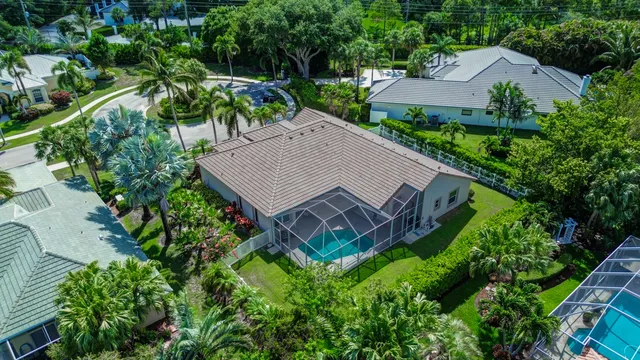 an aerial view of a house with a garden