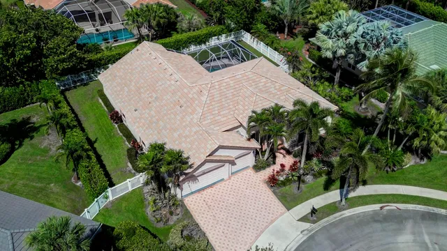 a kitchen with stainless steel appliances granite countertop a sink and a stove