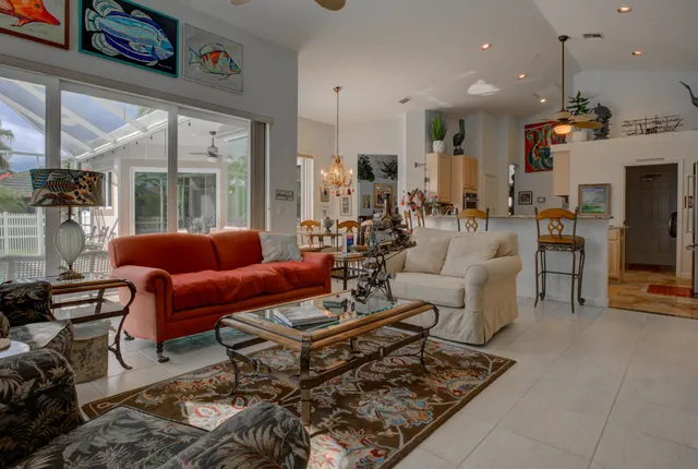 a bathroom with a tub a sink and a shower