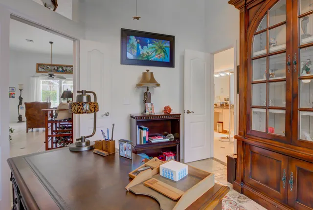 a swimming pool with outdoor seating and yard