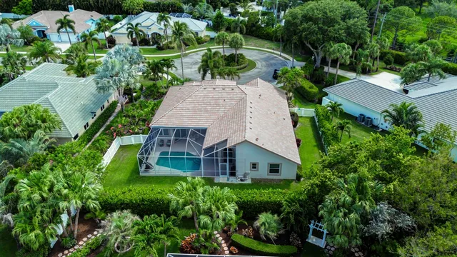 an aerial view of a house with a garden