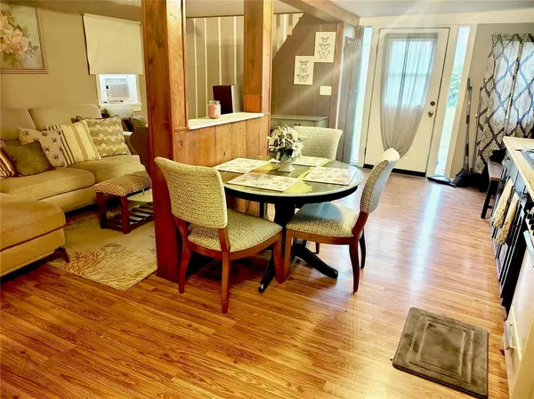 a bedroom with furniture and a window