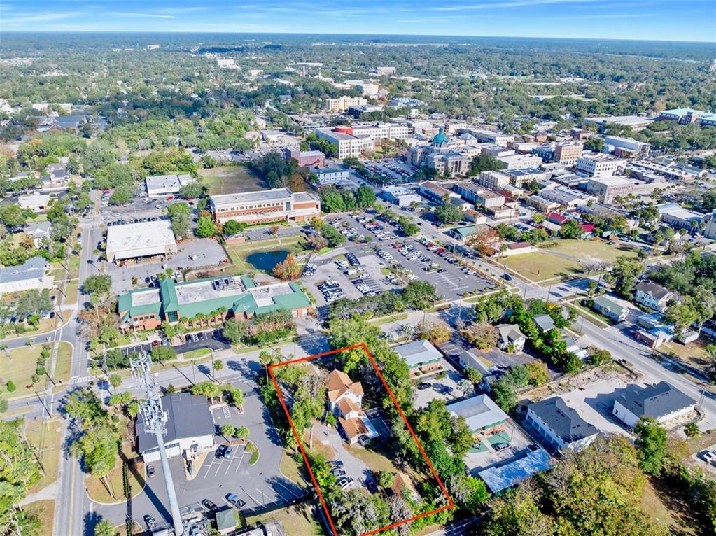 228 West Howry Avenue Deland, FL 32720 - Photo 51 of 51 an aerial view of residential houses with outdoor space