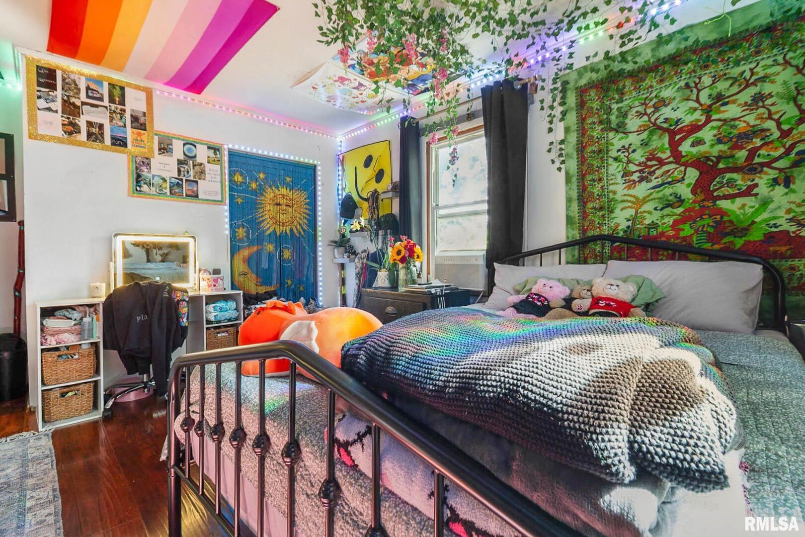 16042 Ralls Grove Road Creal Springs, IL 62922 - Photo 13 of 26 a bedroom with furniture and a window