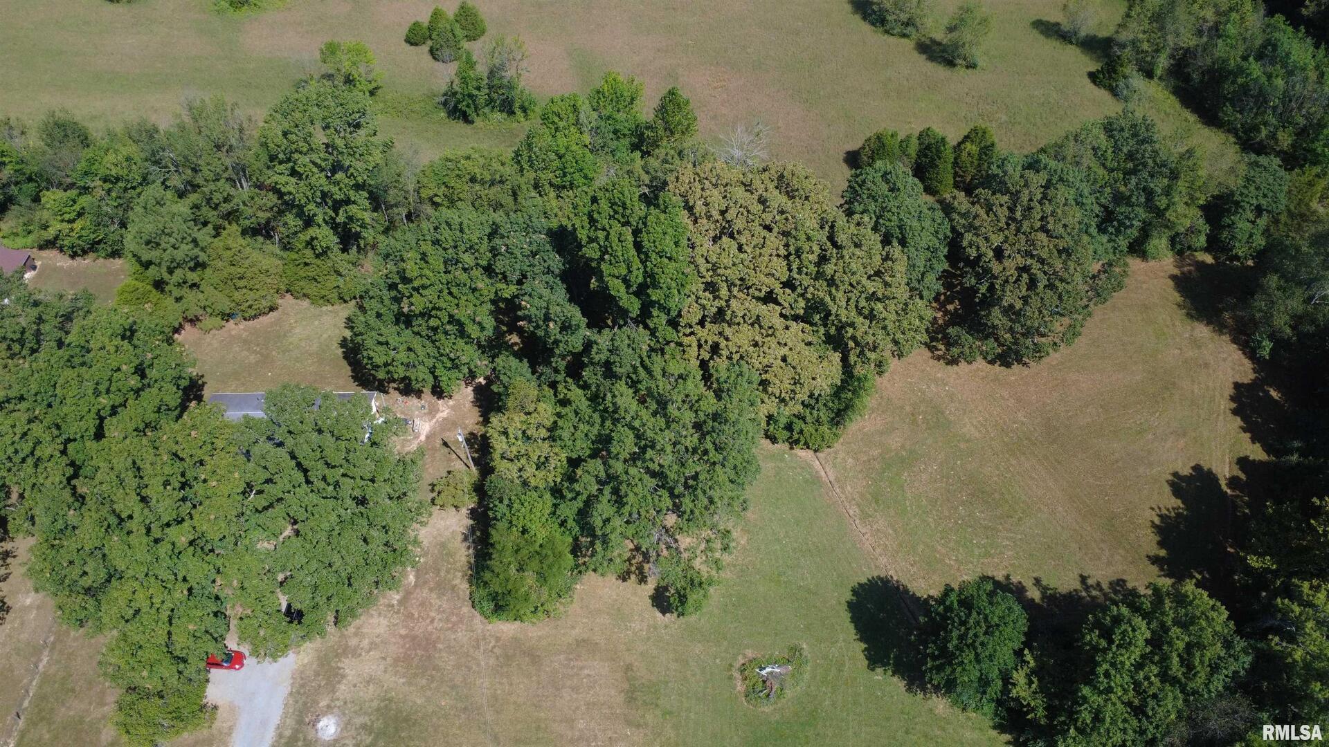 16042 Ralls Grove Road Creal Springs, IL 62922 - Photo 21 of 26 an aerial view of a house with a yard