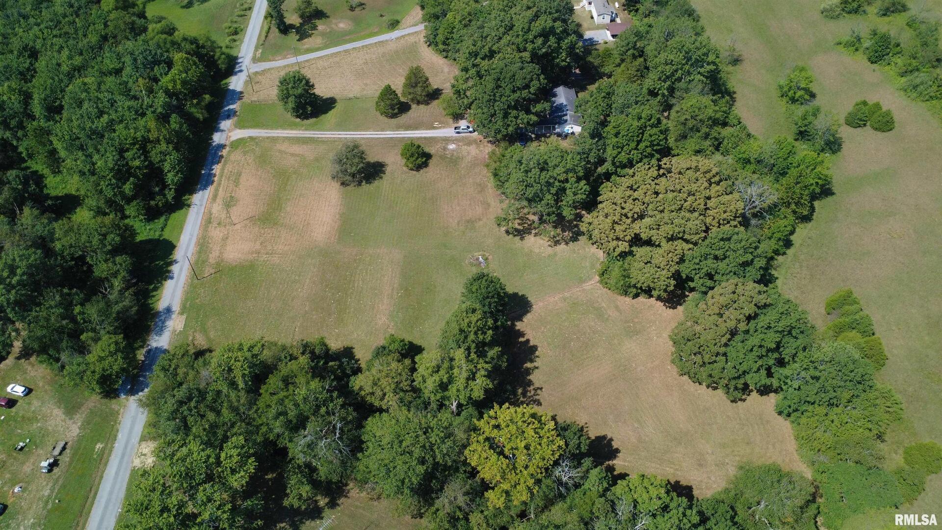 16042 Ralls Grove Road Creal Springs, IL 62922 - Photo 24 of 26 an aerial view of a house with a yard and garden