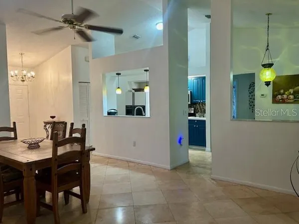 a view of a a dining room with furniture