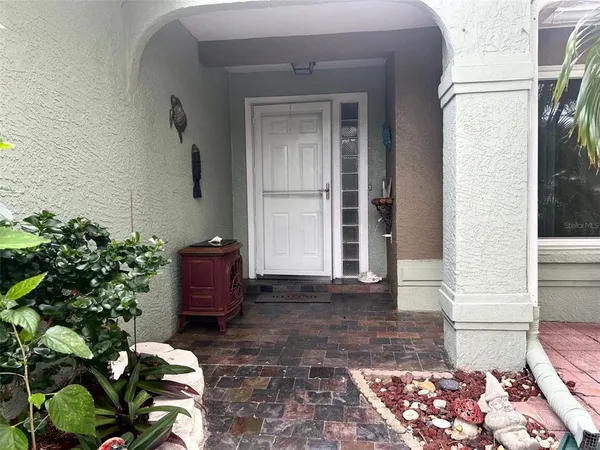 a view of a entryway door of the house