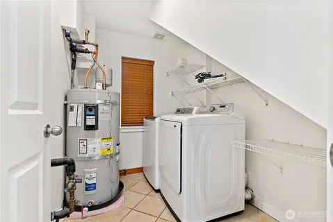 a backyard of a house with outdoor seating