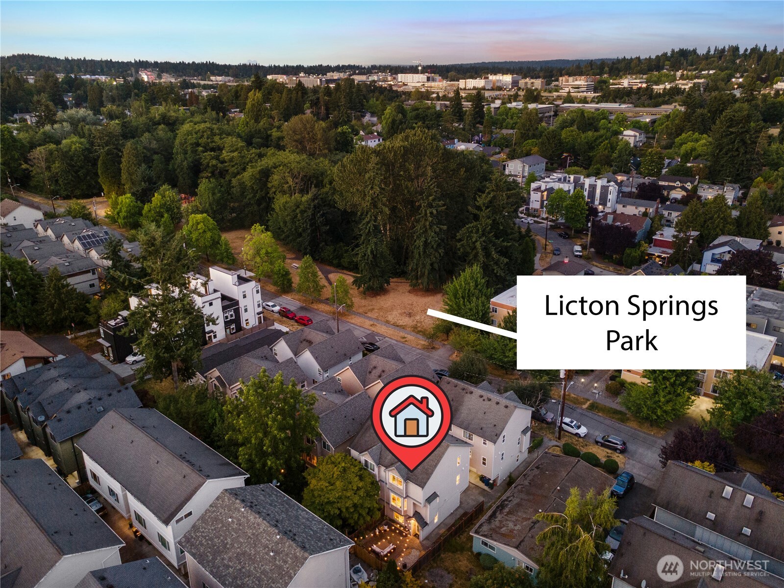 9239 Ashworth Avenue North, Unit B Seattle, WA 98103 - Photo 33 of 40 an outdoor space with table and chairs