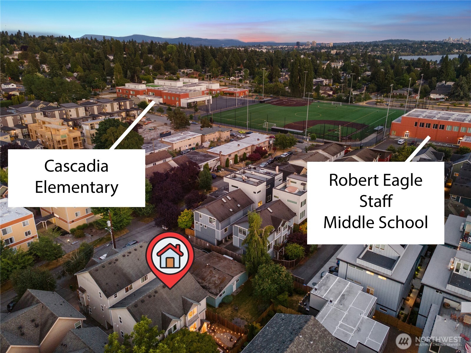 9239 Ashworth Avenue North, Unit B Seattle, WA 98103 - Photo 34 of 40 a view of a park with furniture and a garden