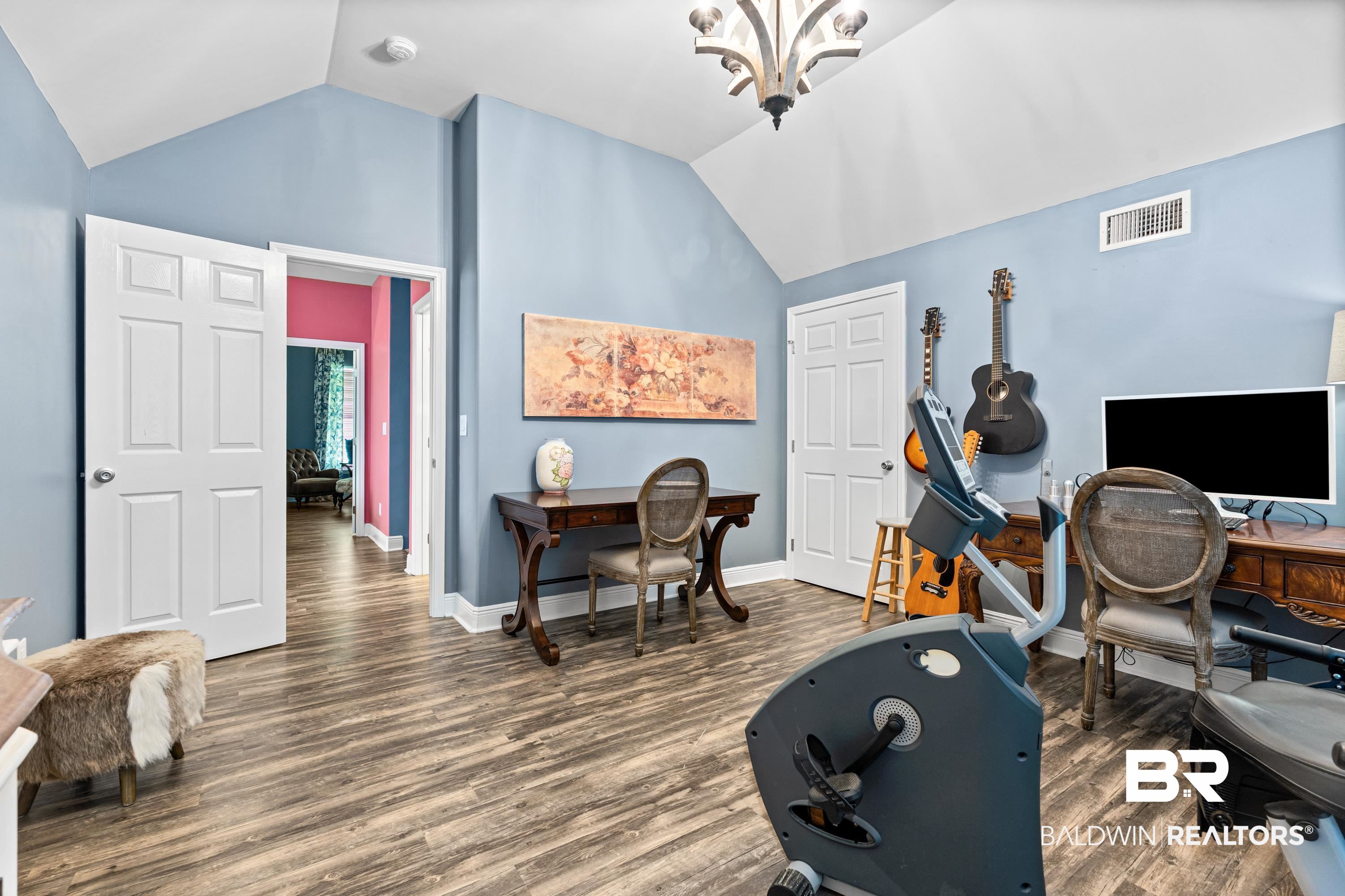 1113 Yellow Daisy Lane Foley, AL 36535 - Photo 23 of 35 Office with lofted ceiling, wood finished floors, and a chandelier