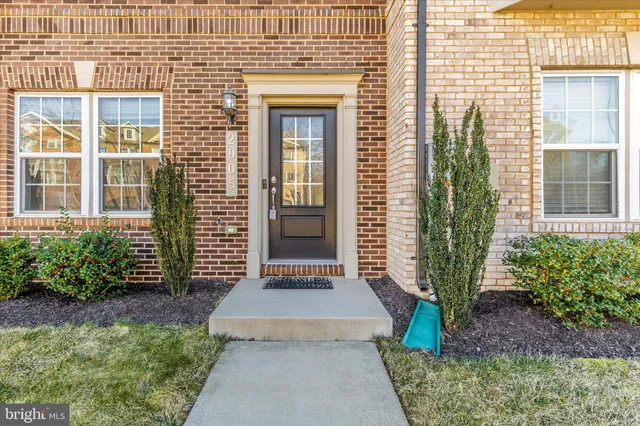 a front view of a house with a porch