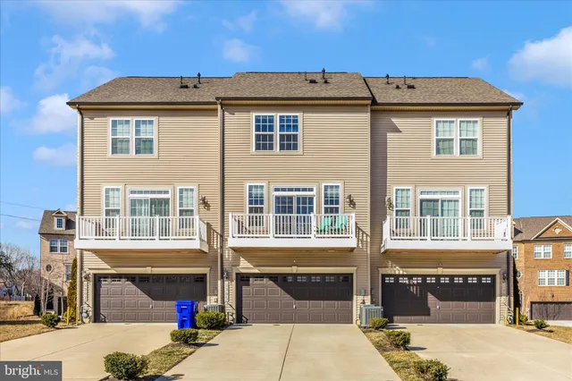 a front view of a house with a outdoor space