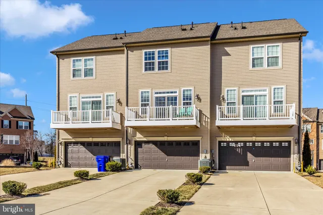 a view of a balcony with chairs