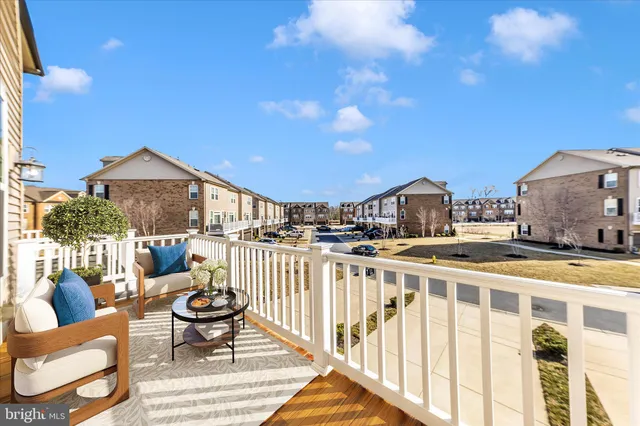 a view of a brick building from a balcony