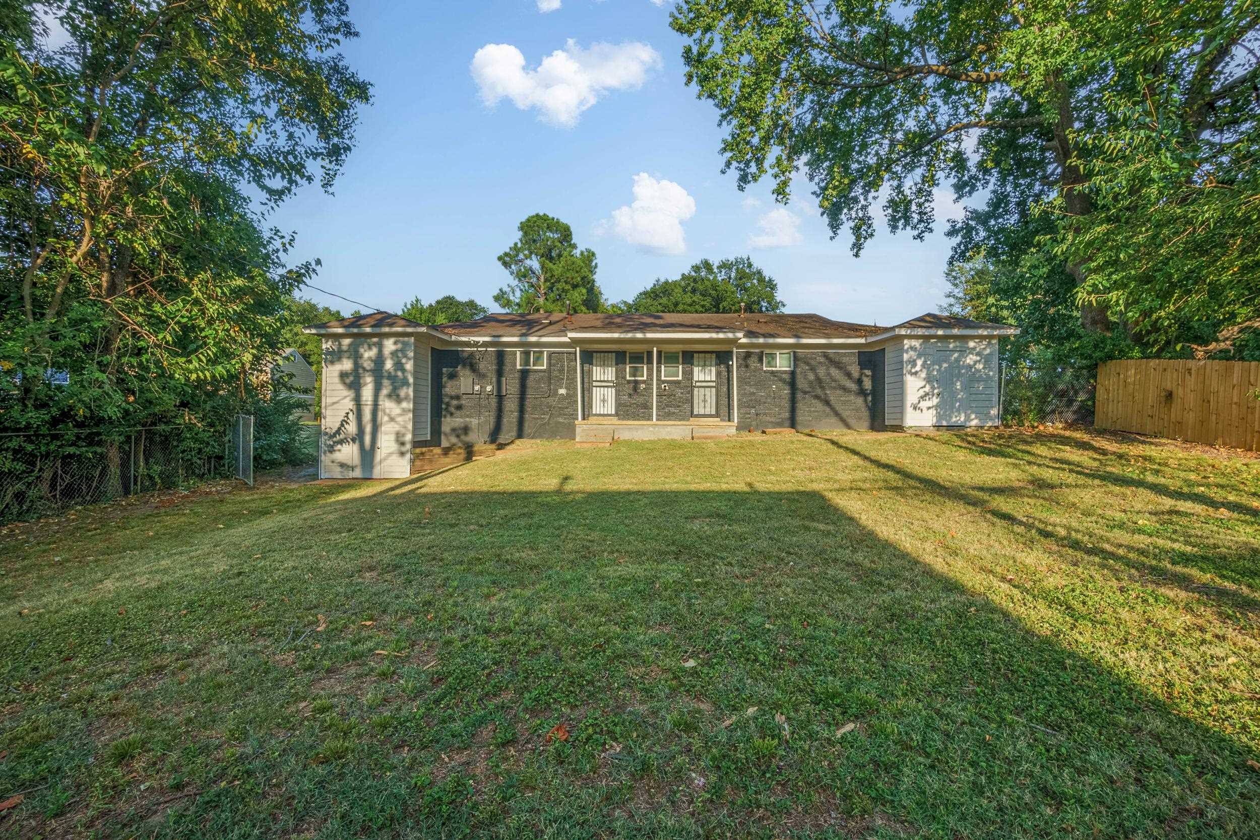 1223 Aubra Road Memphis, TN 38111 - Photo 18 of 19 a view of a house with a yard