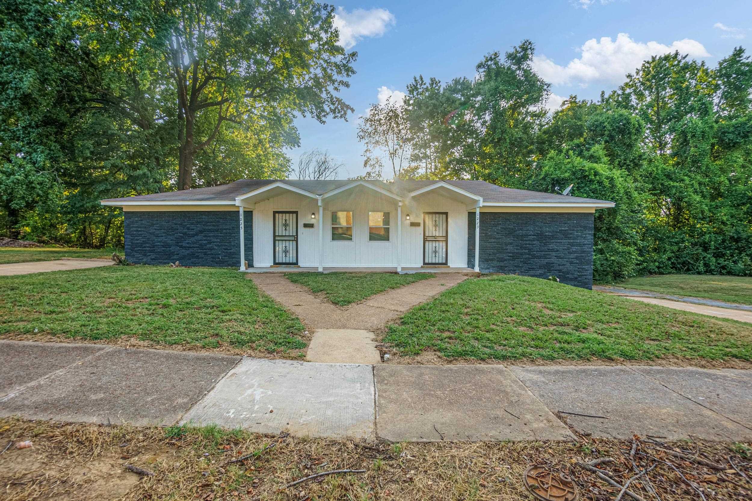 1223 Aubra Road Memphis, TN 38111 - Photo 2 of 19 front view of a house with a yard