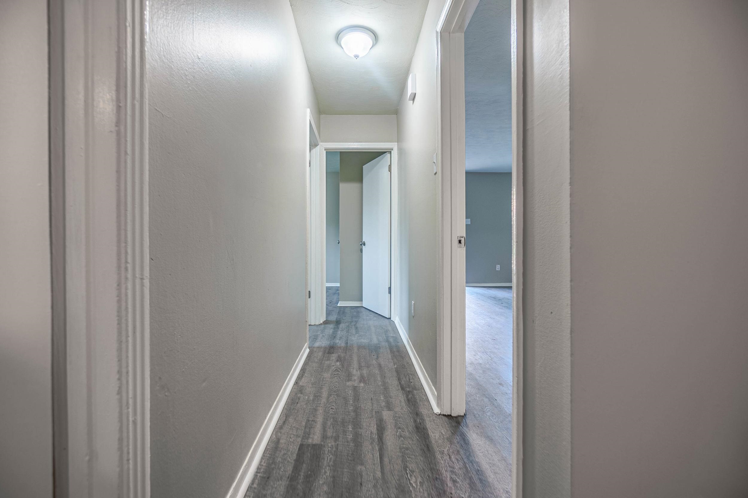 1223 Aubra Road Memphis, TN 38111 - Photo 10 of 19 a view of a hallway with wooden floor