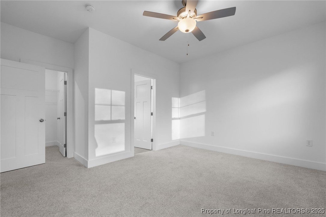 144 Vorster Road Raeford, NC 28376 - Photo 15 of 35 an empty room with closet and windows