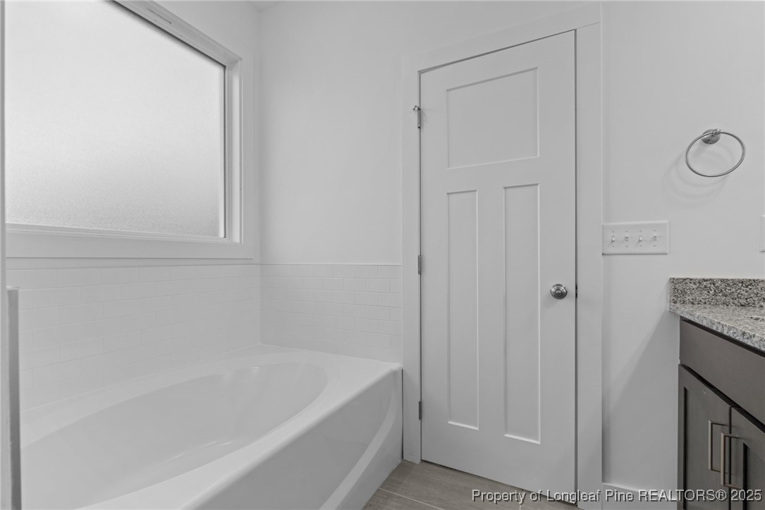 144 Vorster Road Raeford, NC 28376 - Photo 17 of 35 a bathroom with a bathtub