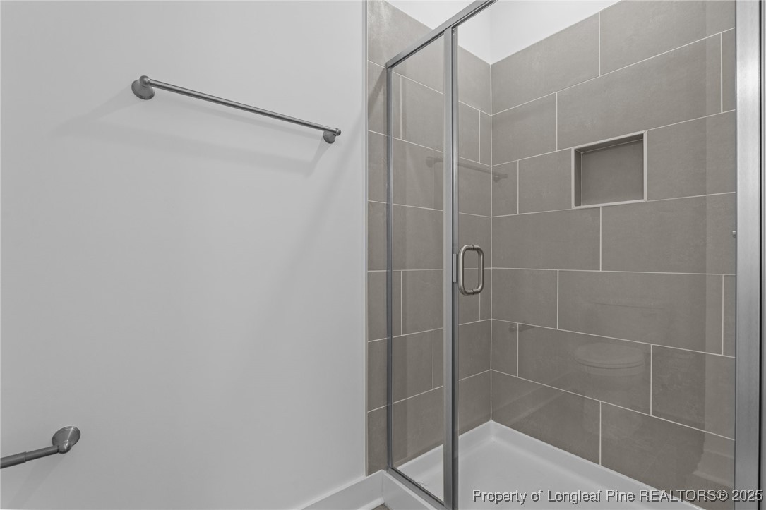 144 Vorster Road Raeford, NC 28376 - Photo 18 of 35 a bathroom with a shower