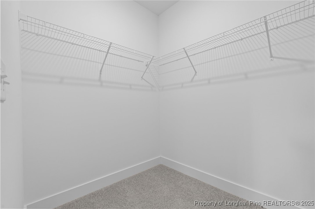 144 Vorster Road Raeford, NC 28376 - Photo 19 of 35 a view of a room with racks on the wall