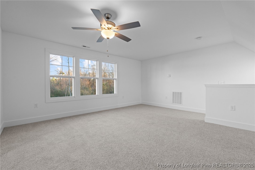 144 Vorster Road Raeford, NC 28376 - Photo 24 of 35 a view of an empty room with a window