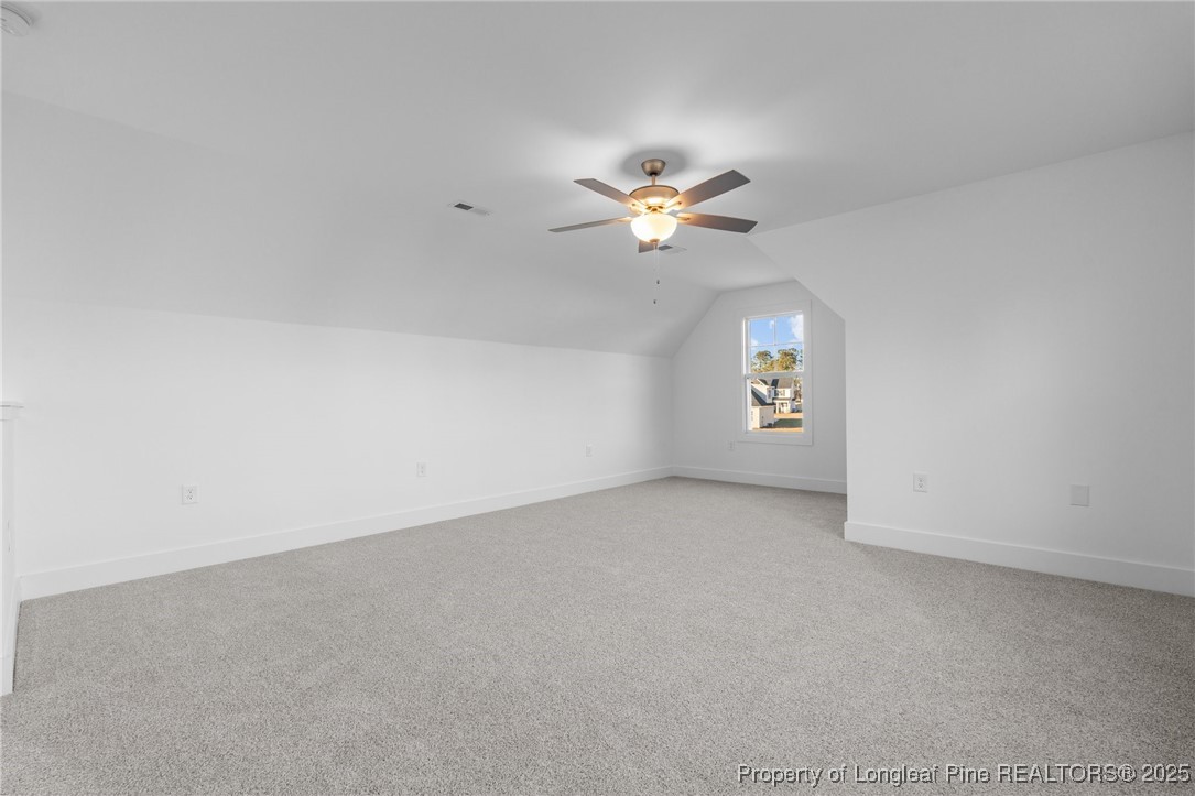 144 Vorster Road Raeford, NC 28376 - Photo 26 of 35 an empty room with a window and a ceiling fan