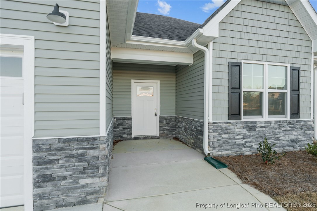 144 Vorster Road Raeford, NC 28376 - Photo 4 of 35 a front view of a house with a yard