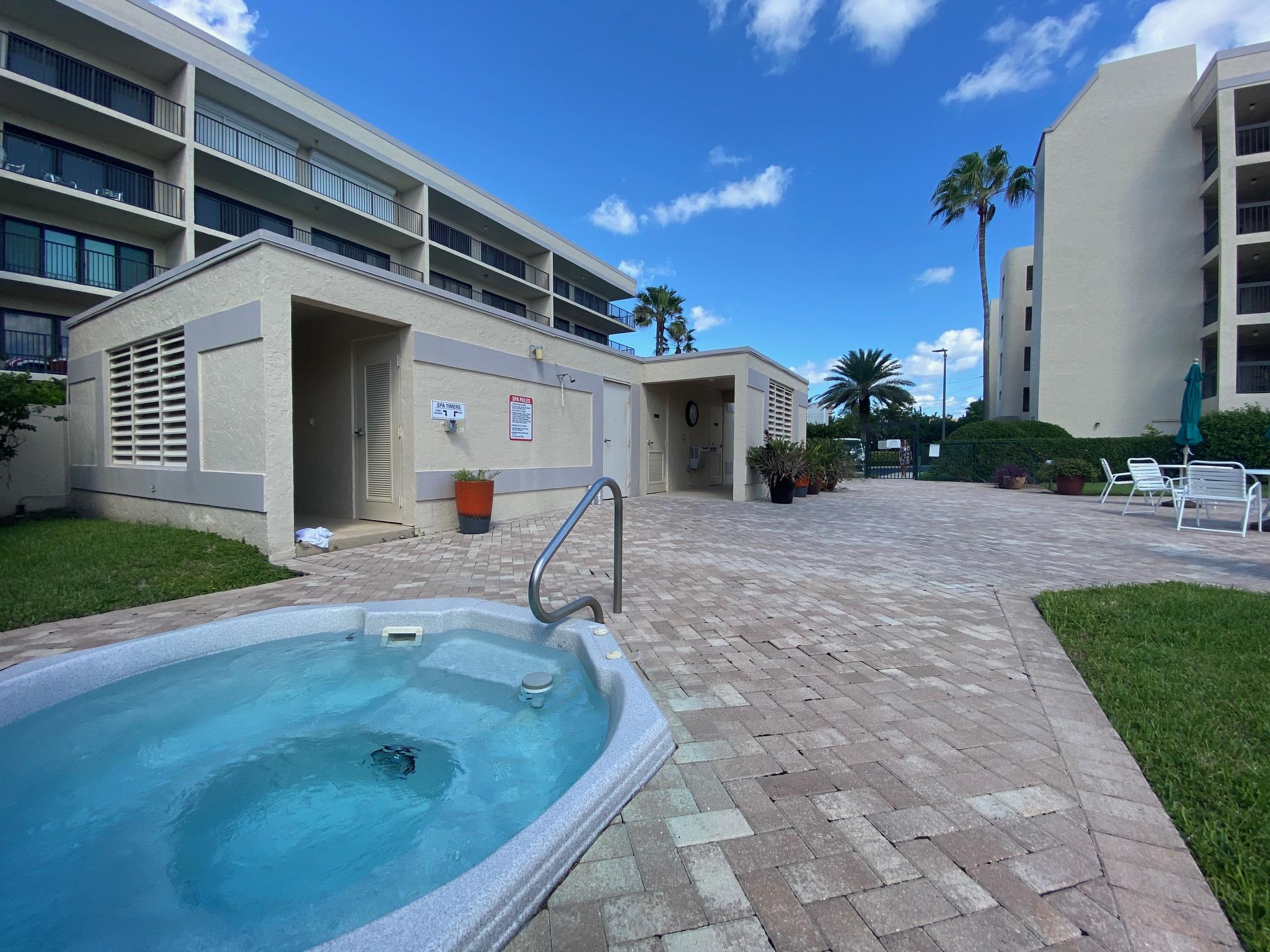 1055 Ocean Drive, Unit 403 Juno Beach, FL 33408 - Photo 13 of 28 a view of a house with backyard