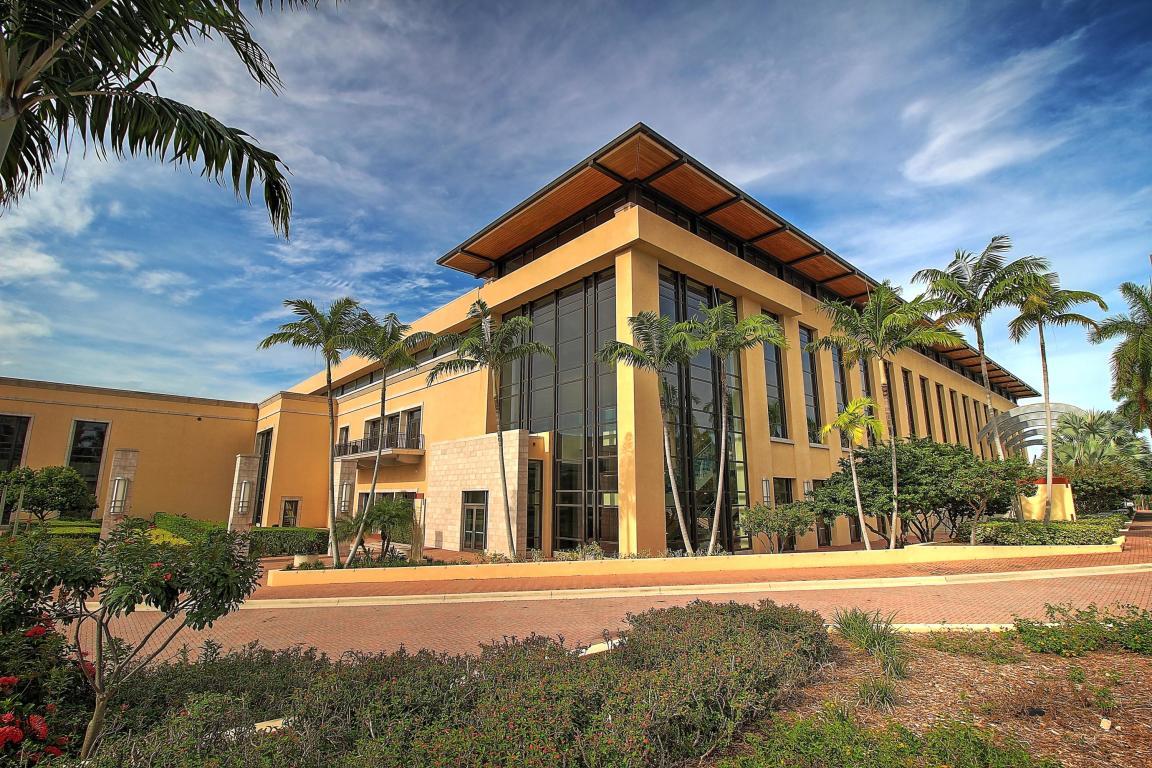 1055 Ocean Drive, Unit 403 Juno Beach, FL 33408 - Photo 27 of 28 front view of a house with a yard