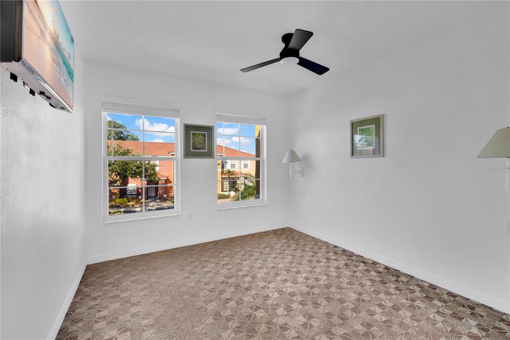 1070 Park Ridge Circle Kissimmee, FL 34746 - Photo 16 of 36 a view of empty room with windows