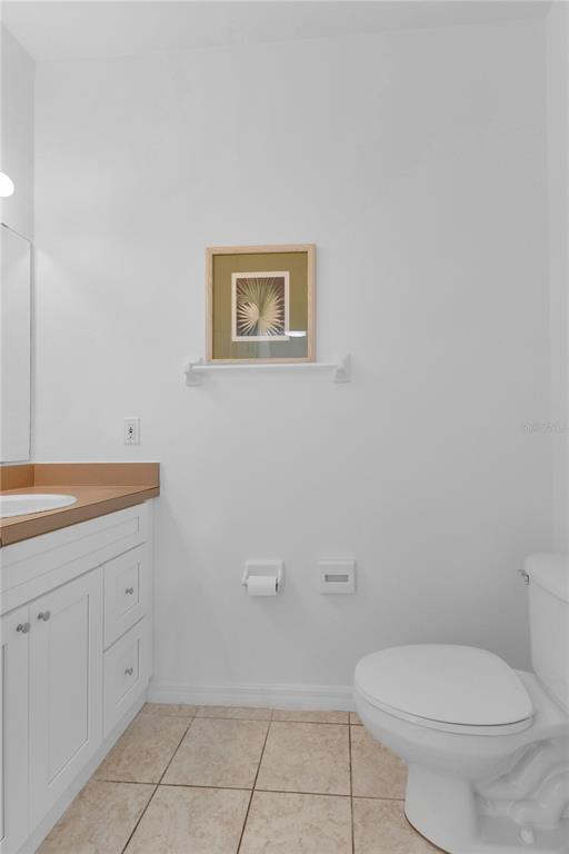 1070 Park Ridge Circle Kissimmee, FL 34746 - Photo 18 of 36 a bathroom with a toilet a sink and view