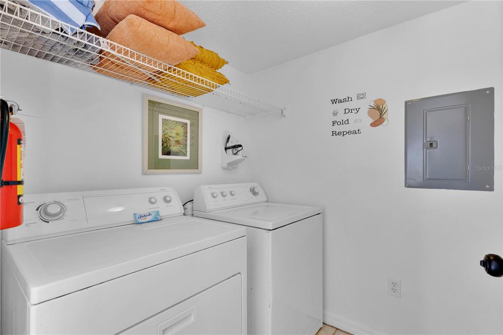 1070 Park Ridge Circle Kissimmee, FL 34746 - Photo 19 of 36 a utility room with dryer and washer