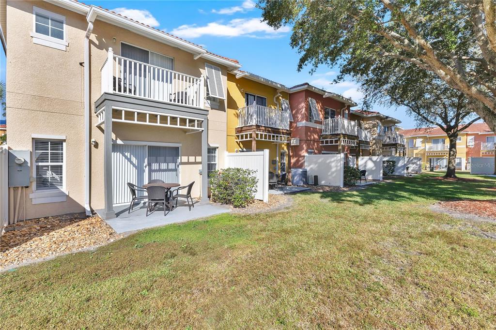 1070 Park Ridge Circle Kissimmee, FL 34746 - Photo 23 of 36 a view of a building with a yard