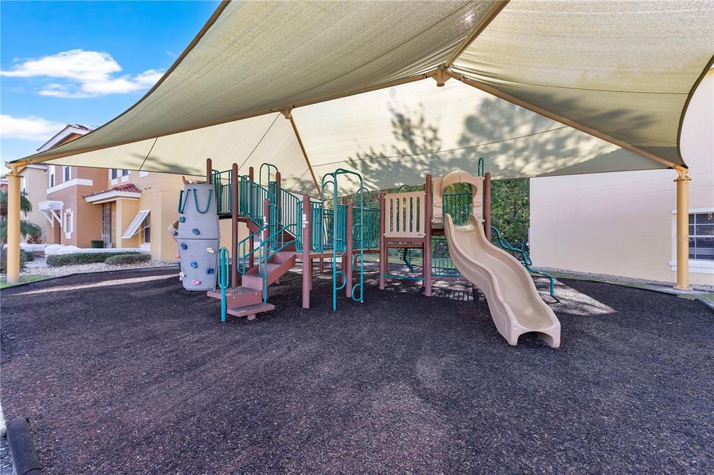 1070 Park Ridge Circle Kissimmee, FL 34746 - Photo 25 of 36 a view of outdoor space with porch and outdoor seating