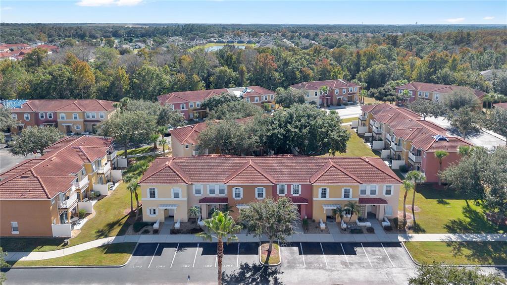 1070 Park Ridge Circle Kissimmee, FL 34746 - Photo 32 of 36 an aerial view of a house with a garden