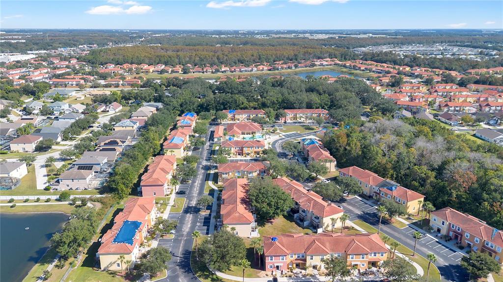 1070 Park Ridge Circle Kissimmee, FL 34746 - Photo 34 of 36 an aerial view of residential houses with outdoor space