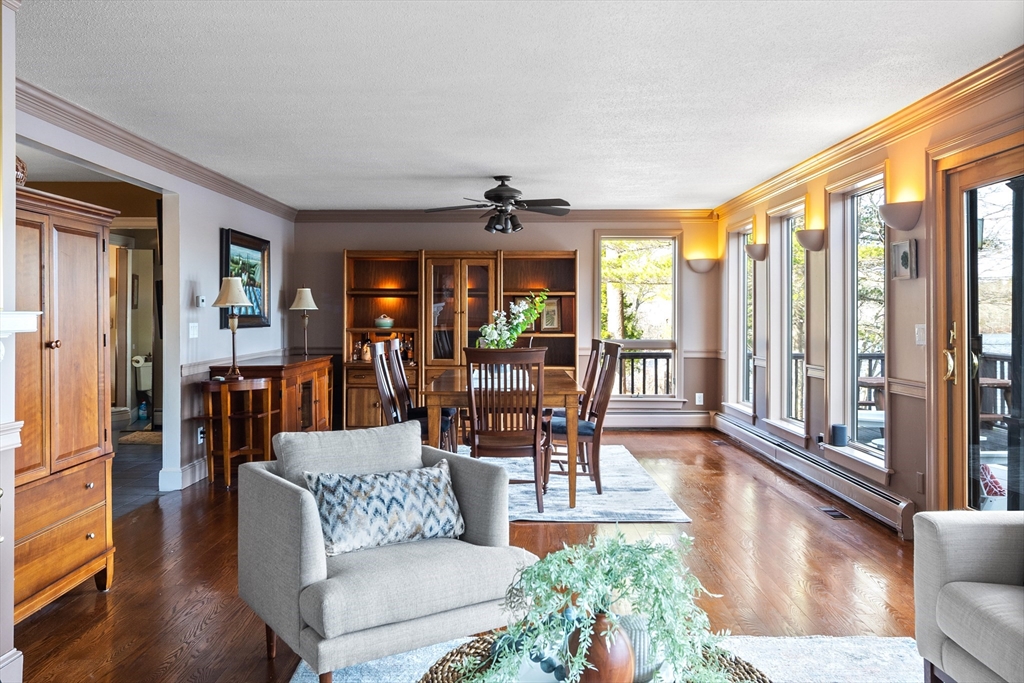 152 Kimball Road Amesbury, MA 01913 - Photo 4 of 20 a living room with furniture large window and wooden floor